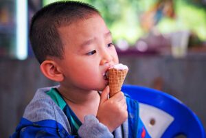 Boy eating and ice cream cone