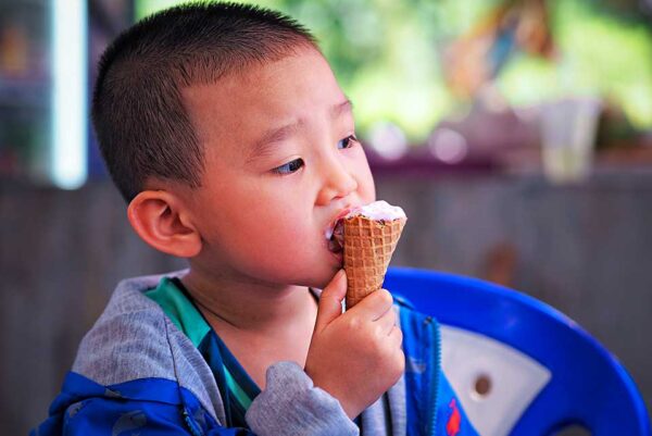 Boy eating and ice cream cone